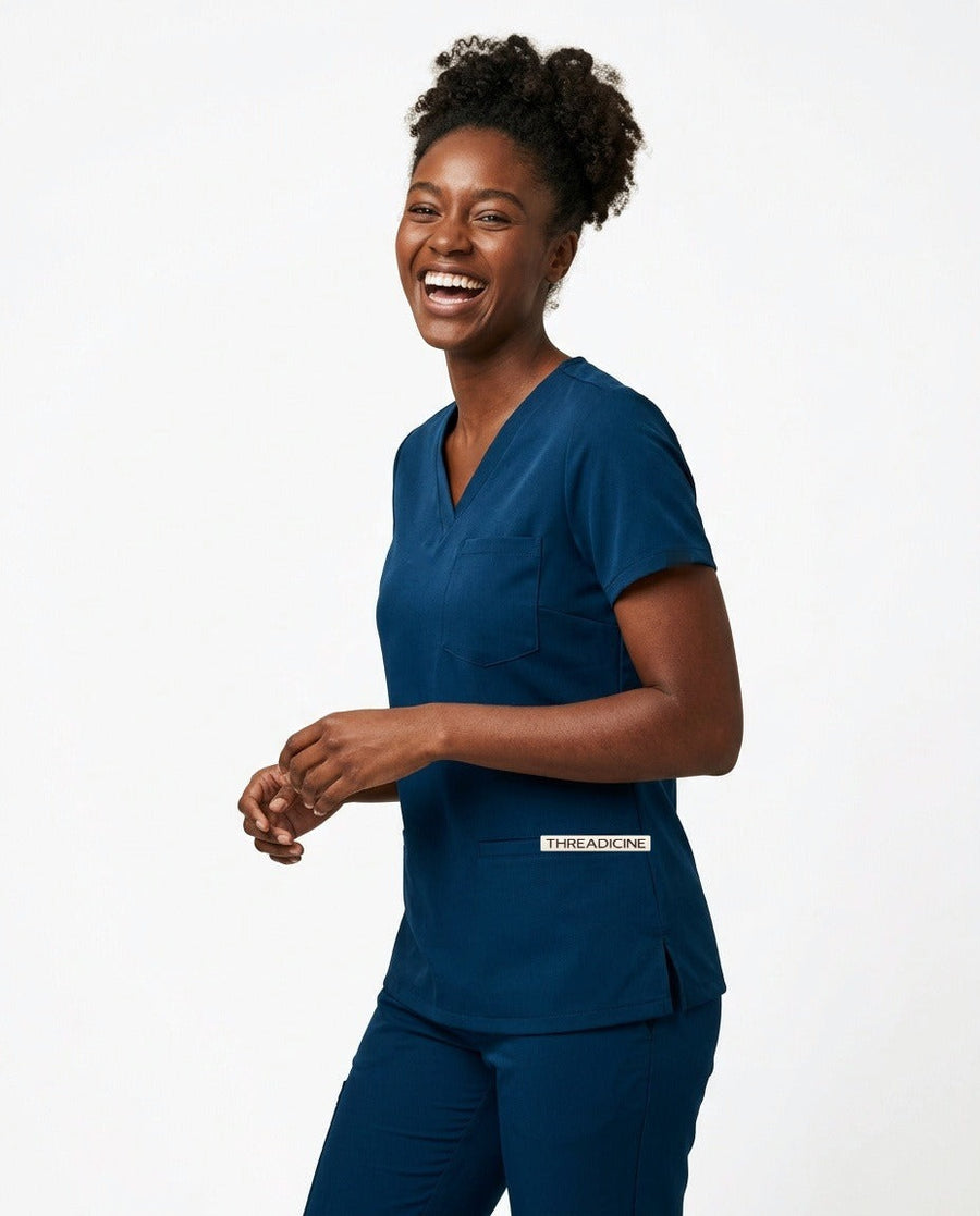 Women's Atelier V-neck top scrubs in Blue – front view | Threadicine