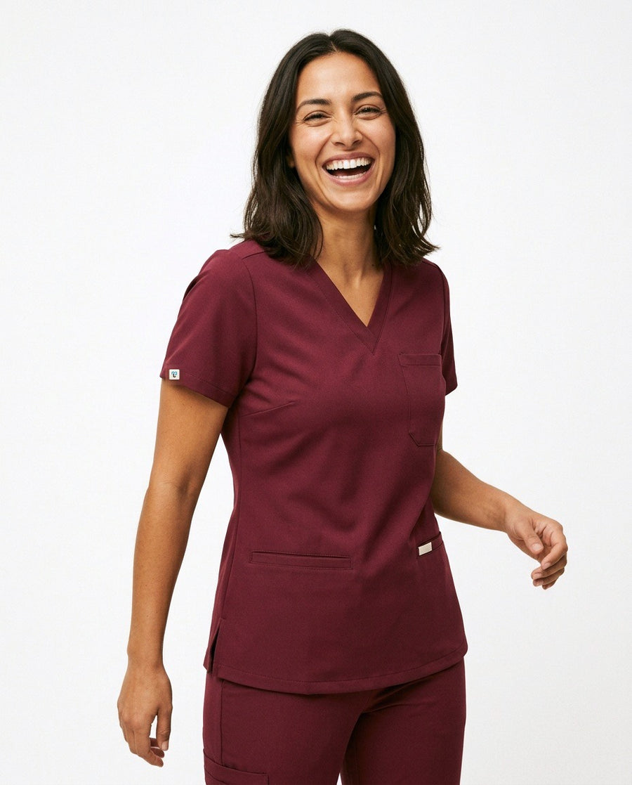 Women's Atelier V-neck top scrubs in Burgundy – front view | Threadicine