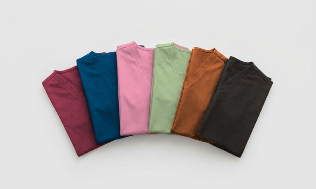 Six Threadicine scrub tops in burgundy, blue, pink, matcha, brown and black