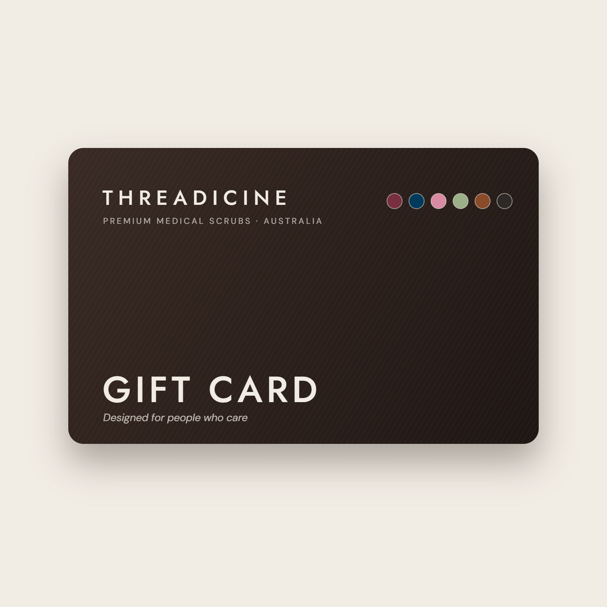 Threadicine scrubs gift card in dark brown with the six scrub colours