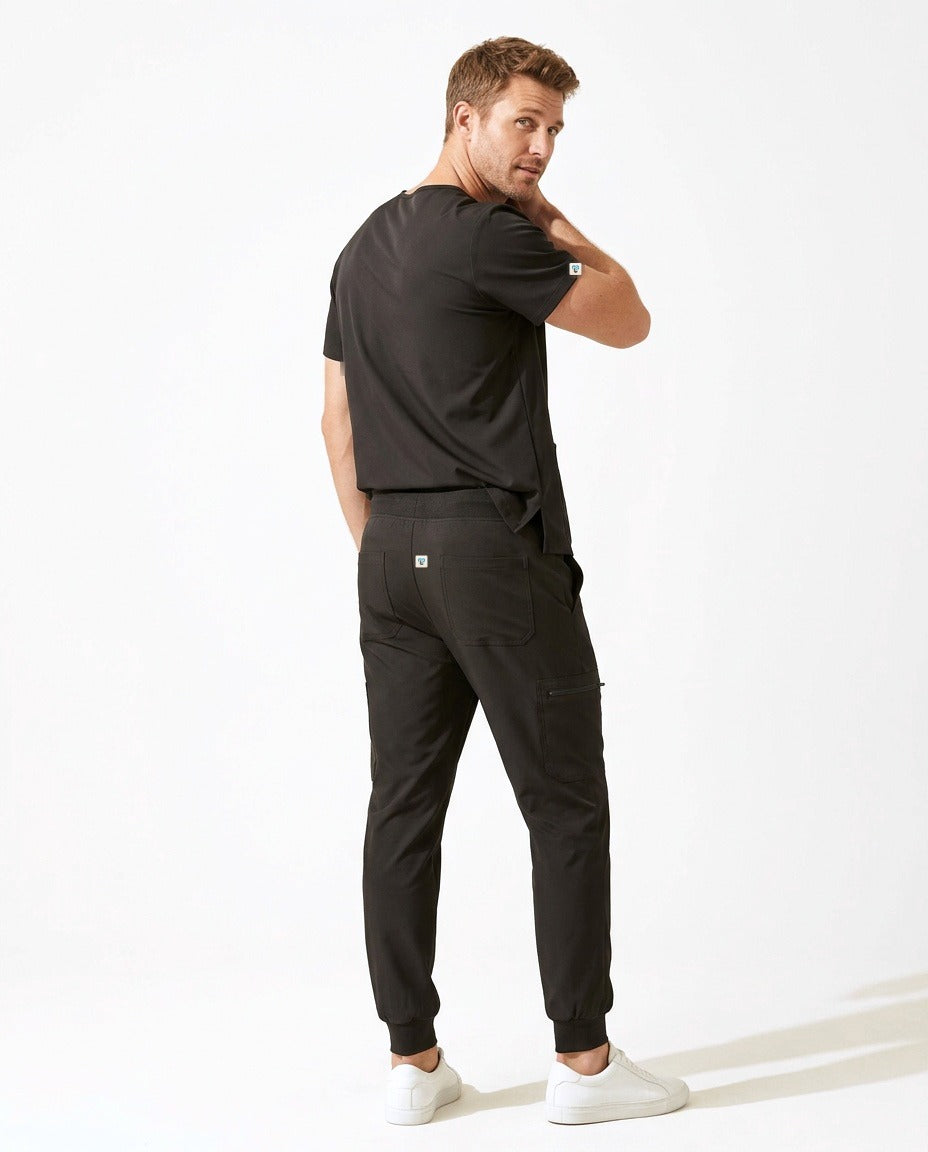 Men's Element V-neck top and Vector jogger pants scrub set in Black – back view | Threadicine