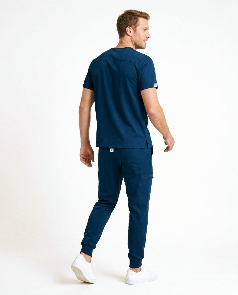 Men's Element V-neck top and Vector jogger pants scrub set in Blue – back view | Threadicine