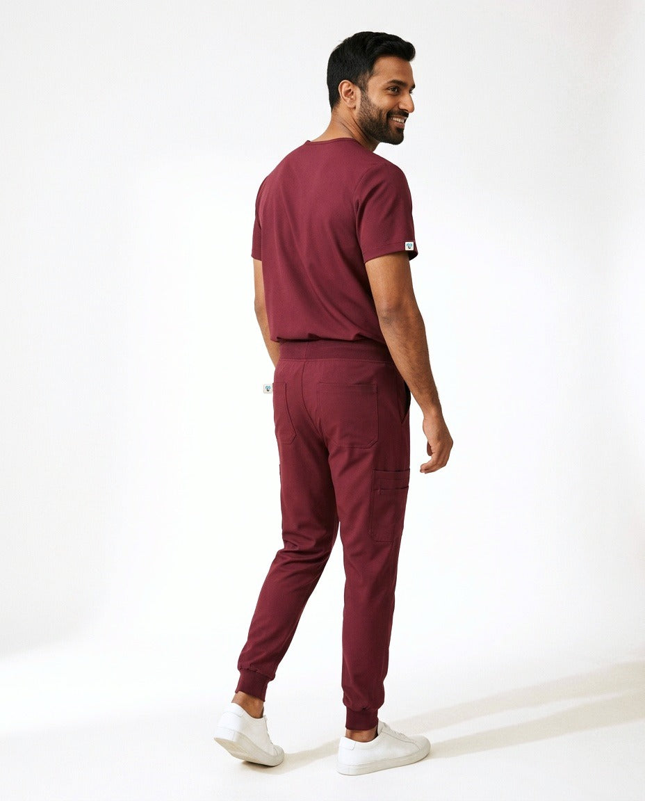 Men's Element V-neck top and Vector jogger pants scrub set in Burgundy – back view | Threadicine