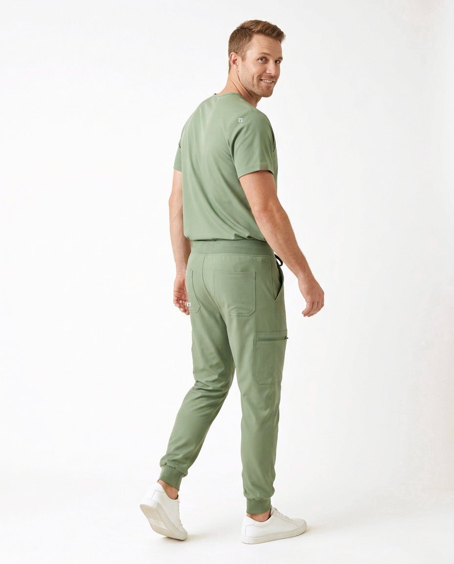 Men's Element V-neck top and Vector jogger pants scrub set in Matcha – back view | Threadicine