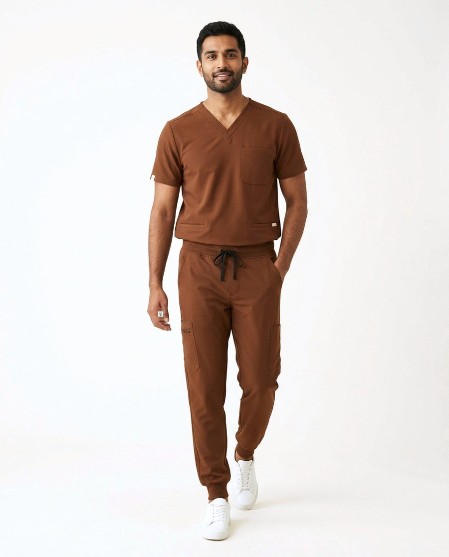 Men's Element V-neck top and Vector jogger pants scrub set in Brown – front view | Threadicine