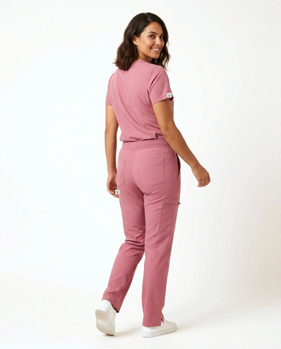 Women's Atelier V-neck top and Linea straight-leg pants scrub set in Pink – back view | Threadicine