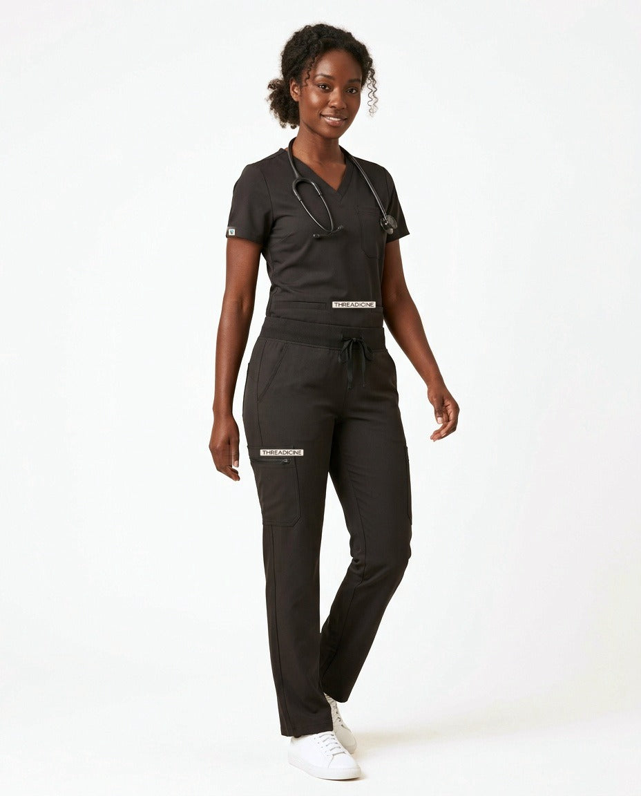Women's Atelier V-neck top and Linea straight-leg pants scrub set in Black – front view | Threadicine