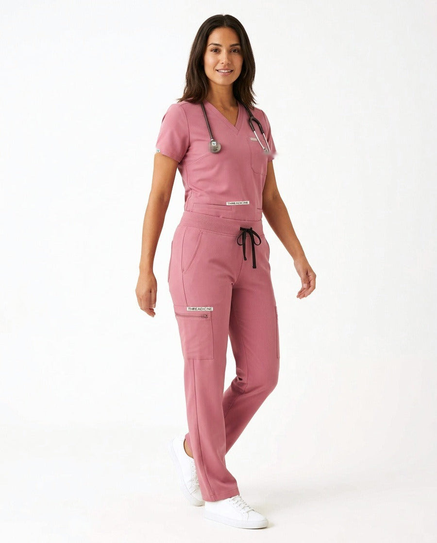 Women's Atelier V-neck top and Linea straight-leg pants scrub set in Pink – front view | Threadicine