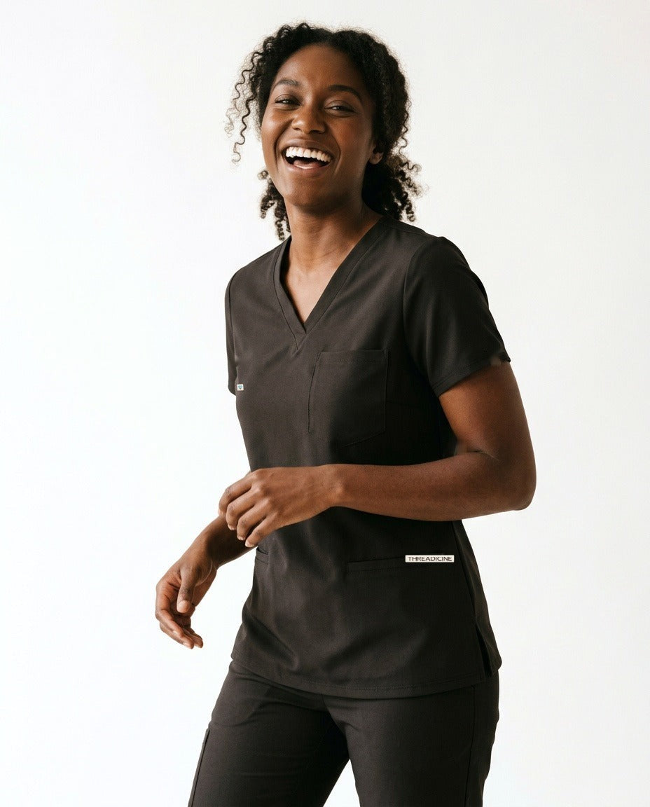 Women's Atelier V-neck top scrubs in Black – front view | Threadicine