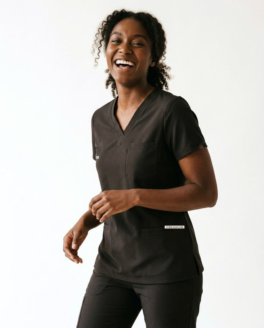Women's Atelier V-neck top scrubs in Black – front view | Threadicine