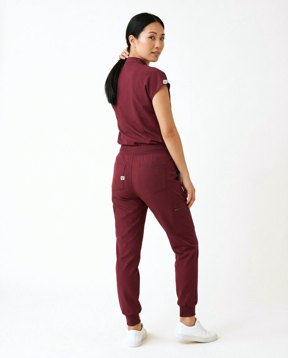 Women's Contour mandarin-collar top and Motive jogger pants scrub set in Burgundy – back view | Threadicine
