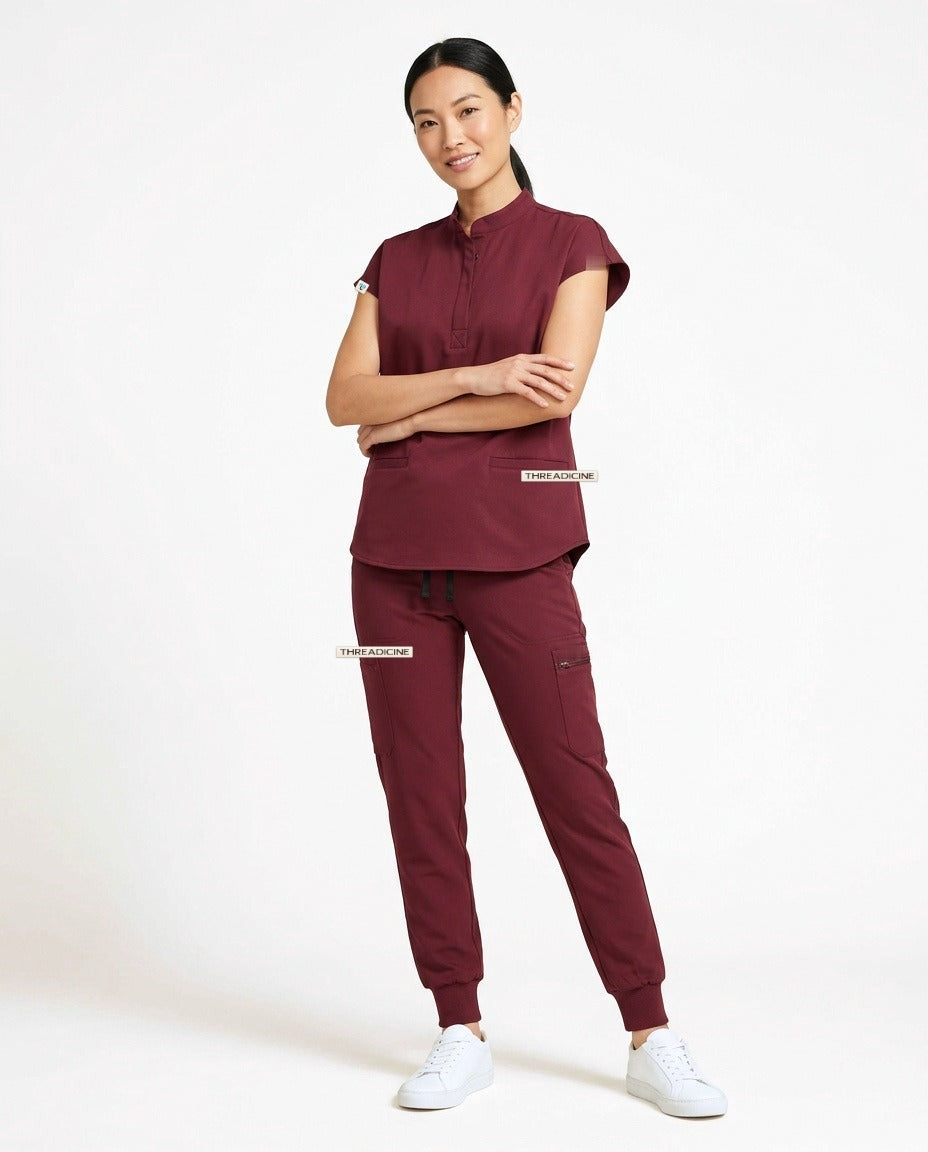 Women's Contour mandarin-collar top and Motive jogger pants scrub set in Burgundy – front view | Threadicine