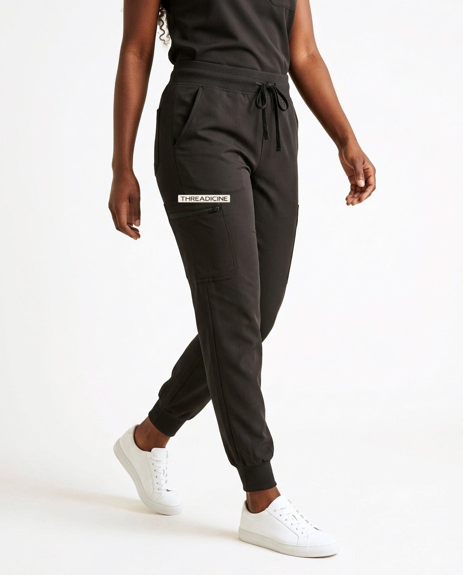 Women's Motive jogger pants scrubs in Black – front view | Threadicine