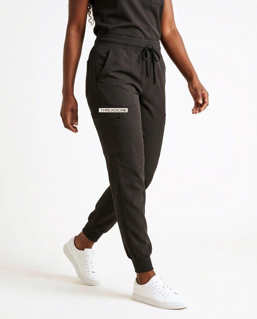 Women's Motive jogger pants scrubs in Black – front view | Threadicine