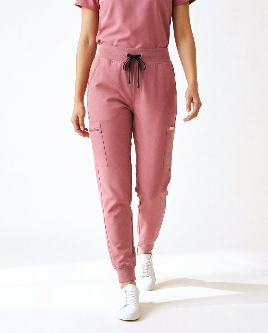 Women's Motive jogger pants scrubs in Pink – front view | Threadicine